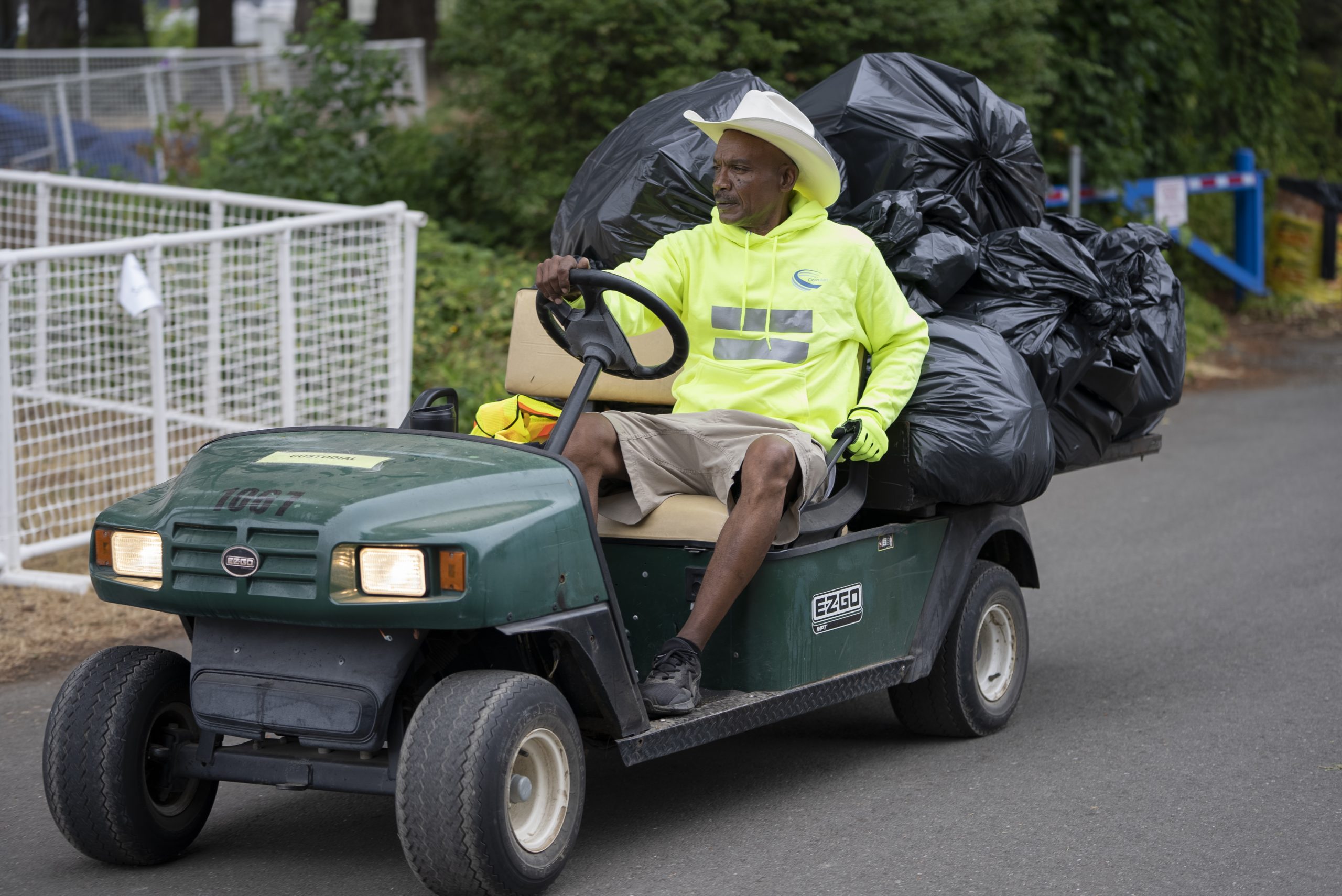 Maintaining Cleanliness During the Event event cleaning - cleaner drive jeep with trash bags
