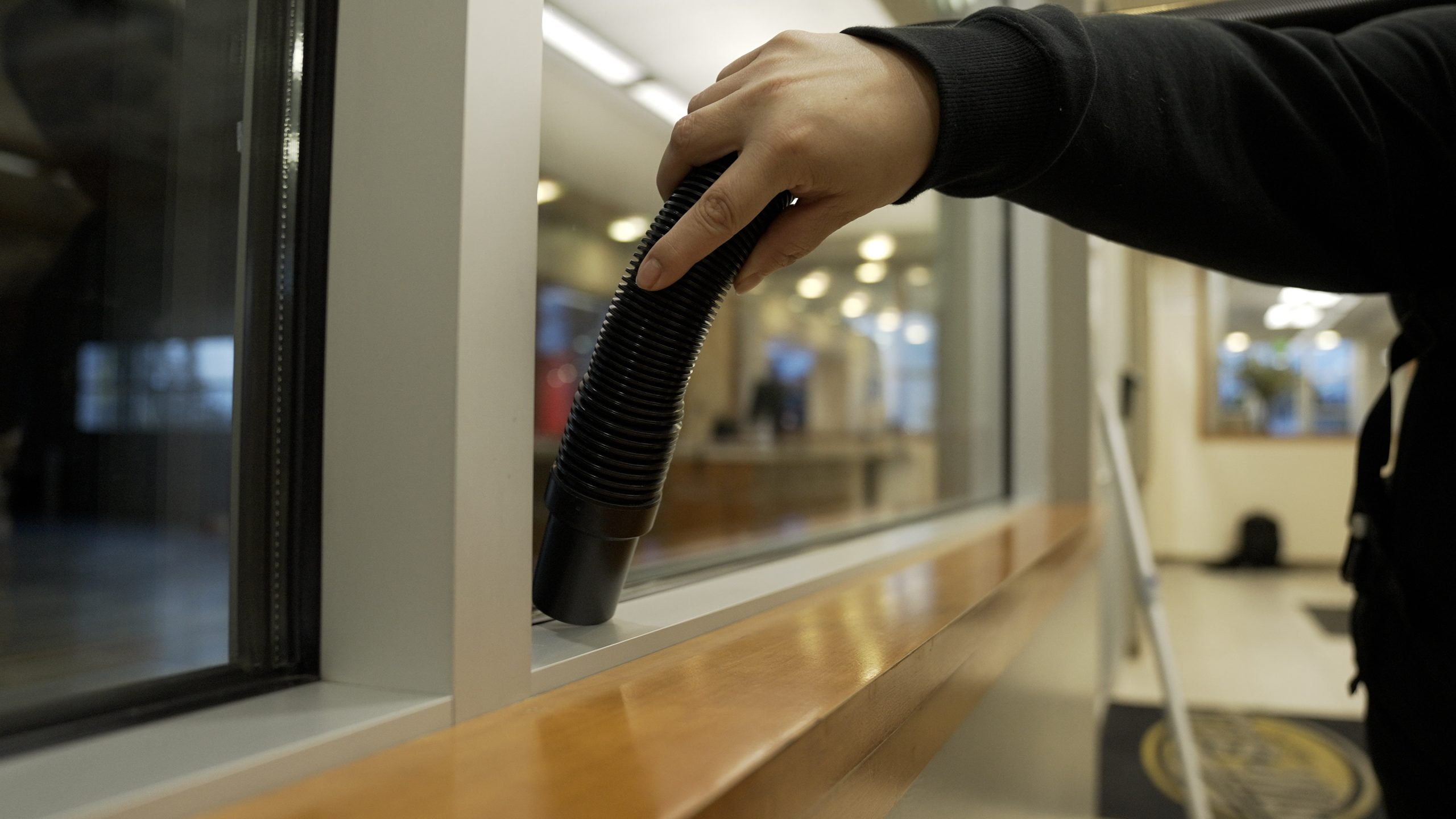  professional move-out cleaning - vacuuming window sill
